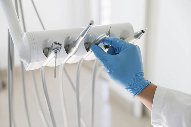 Professional Tooth Extraction technician working in Slope County County, ND